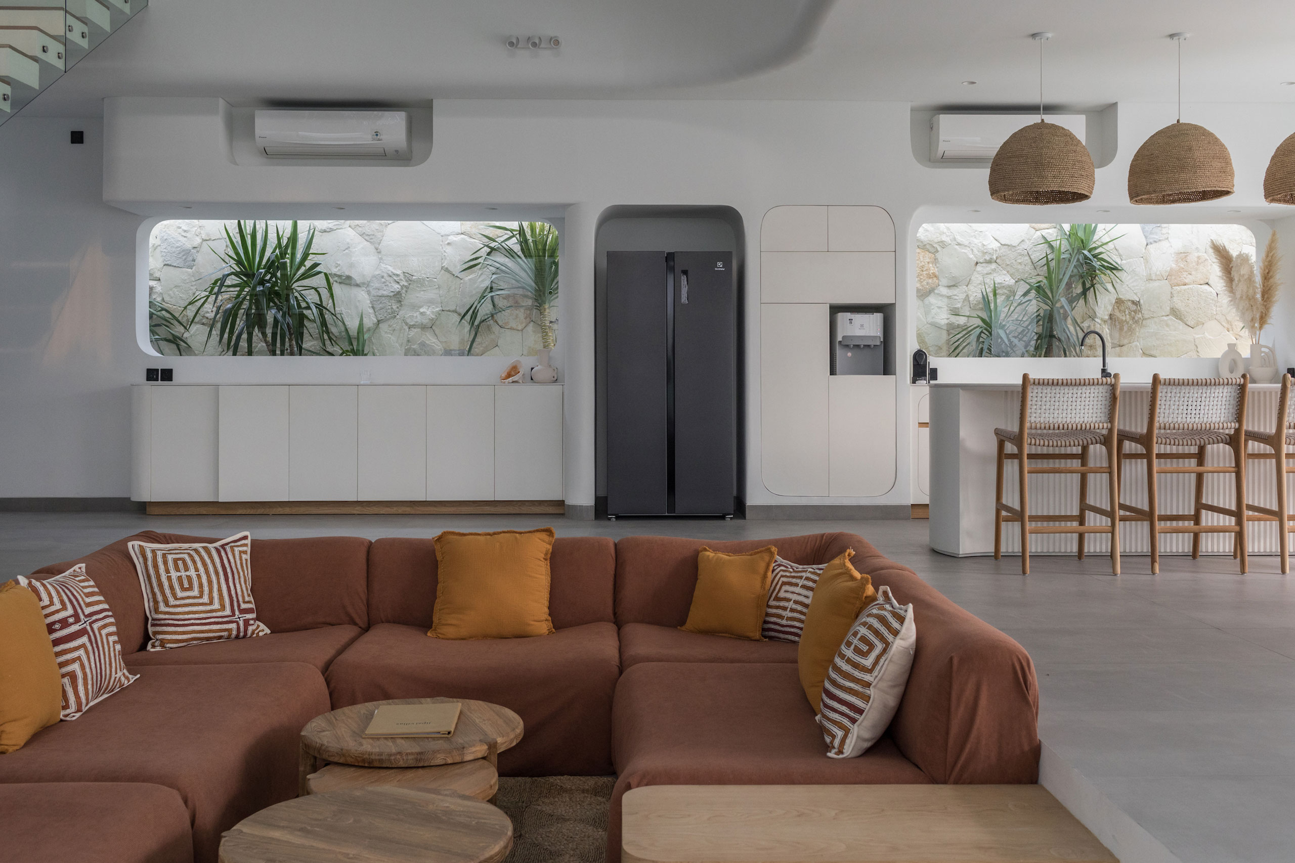 Contemporary kitchen and lounge area with tropical design at Jipsi Villas Bali